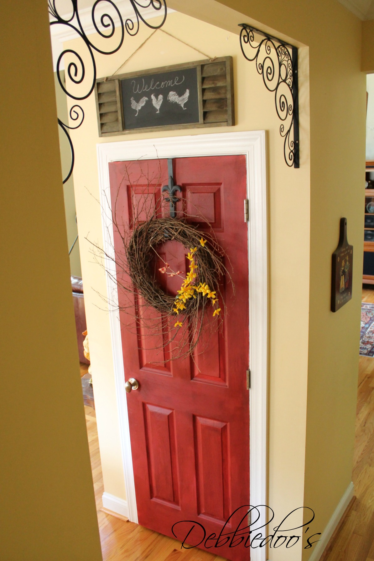 Painting the Pantry door red currant bhg swatch